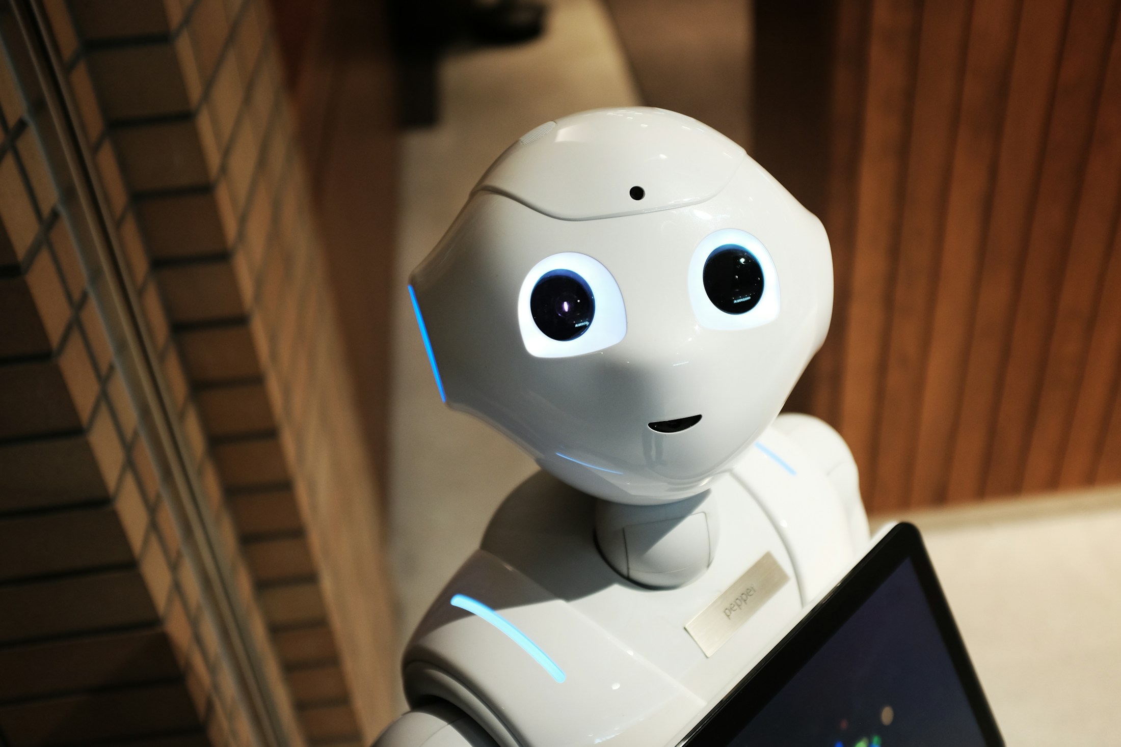 A real assistant robot, used symbolically for AI agents